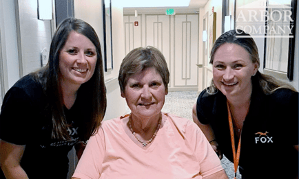 Resident of Arbor Terrace Fulton with Fox Therapy specialists