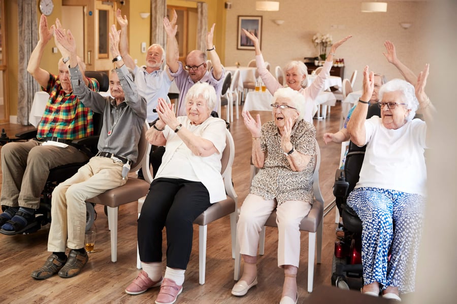 a group of seniors clapping