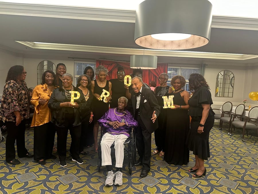 a group of senior residents celebrating their senior living community's prom 