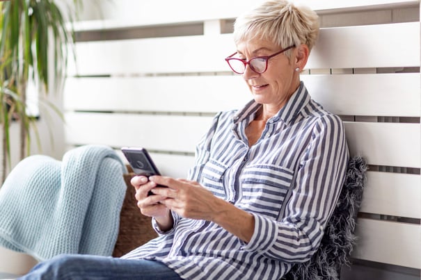 Resident looking at her cellphone