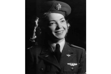 A vintage black-and-white portrait of a woman in a military uniform with wings insignia, honoring the rich life stories of residents at senior living in Suwanee, GA.