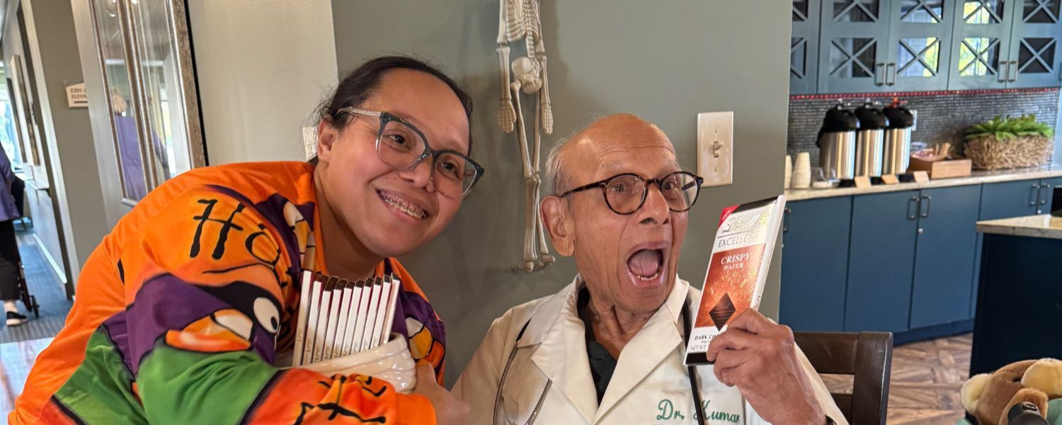 Illinois - resident and staff enjoying halloween candy