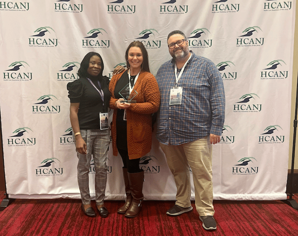 Arbor Terrace Marlton staff receiving an award