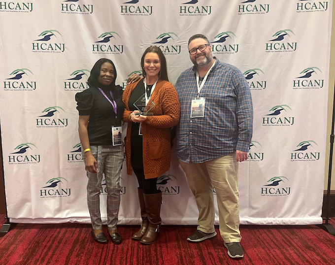 Arbor Terrace Marlton staff receiving an award