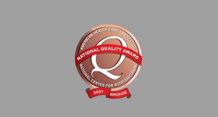 The 2021 AHCA National Quality Award Bronze badge, recognizing Arbor Terrace Morris Plains for its commitment to excellence in assisted living care in Morris Plains, NJ.