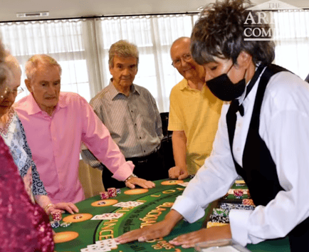 Arbor Terrace Hamilton Mill Residents Playing Poker