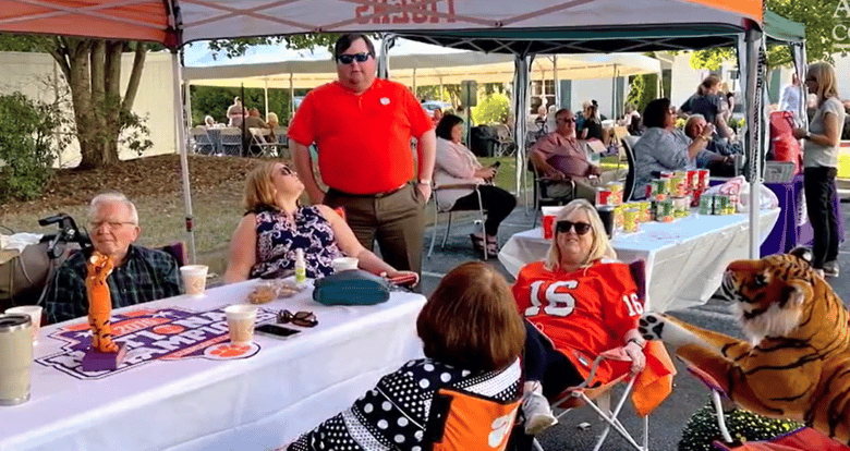 Residents enjoying a tailgate at a football game