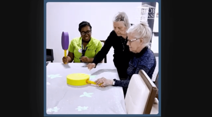 Residents and Staff members using the Tover Table