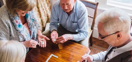 seniors playing dominoes