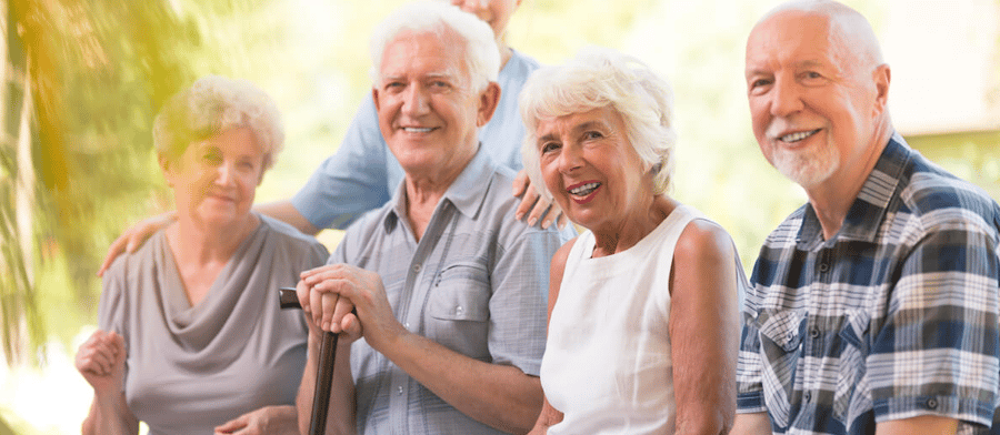 Residents smiling outside