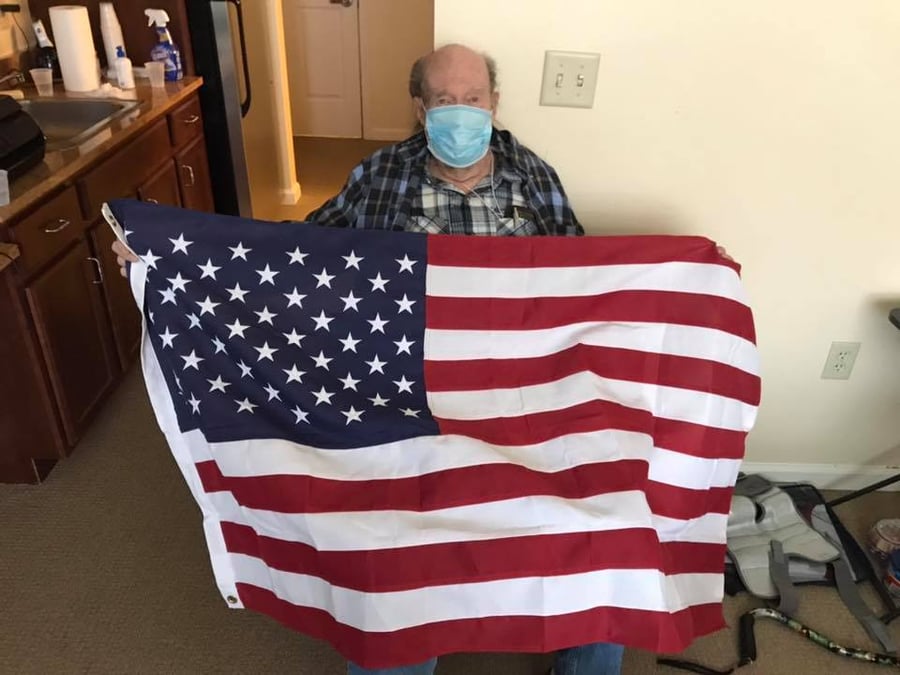 Willistown resident holding a flag