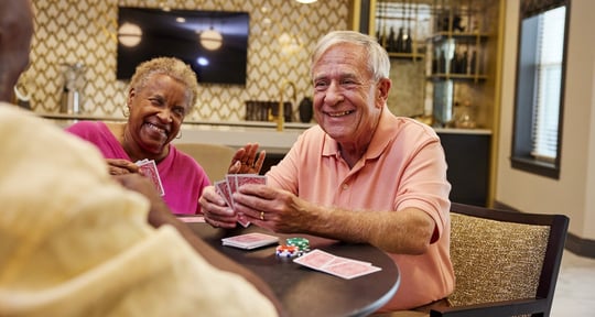 TheArborCompany_SeniorsPlayingCardsLaughing