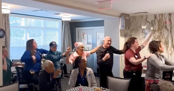 Arbor Terrace Marlton Seniors line dancing in a senior living community