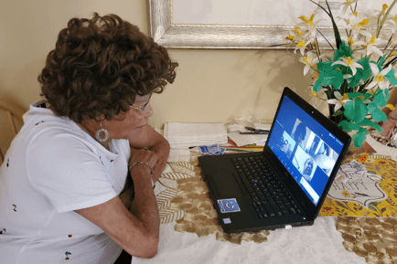 a senior woman using a laptop 
