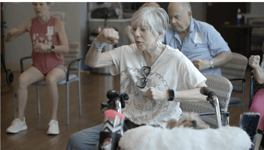 Residents cheerfully participating in a group activity at Arbor Terrace Lakeway, capturing the lively and connected spirit of everyday life in this assisted living Lakeway TX community.